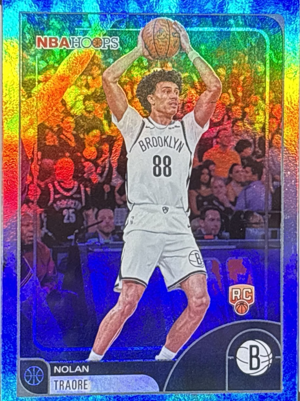 Topps NBA Hoops Nolan Traore Holographic Blue Refractor RC Basketball Card